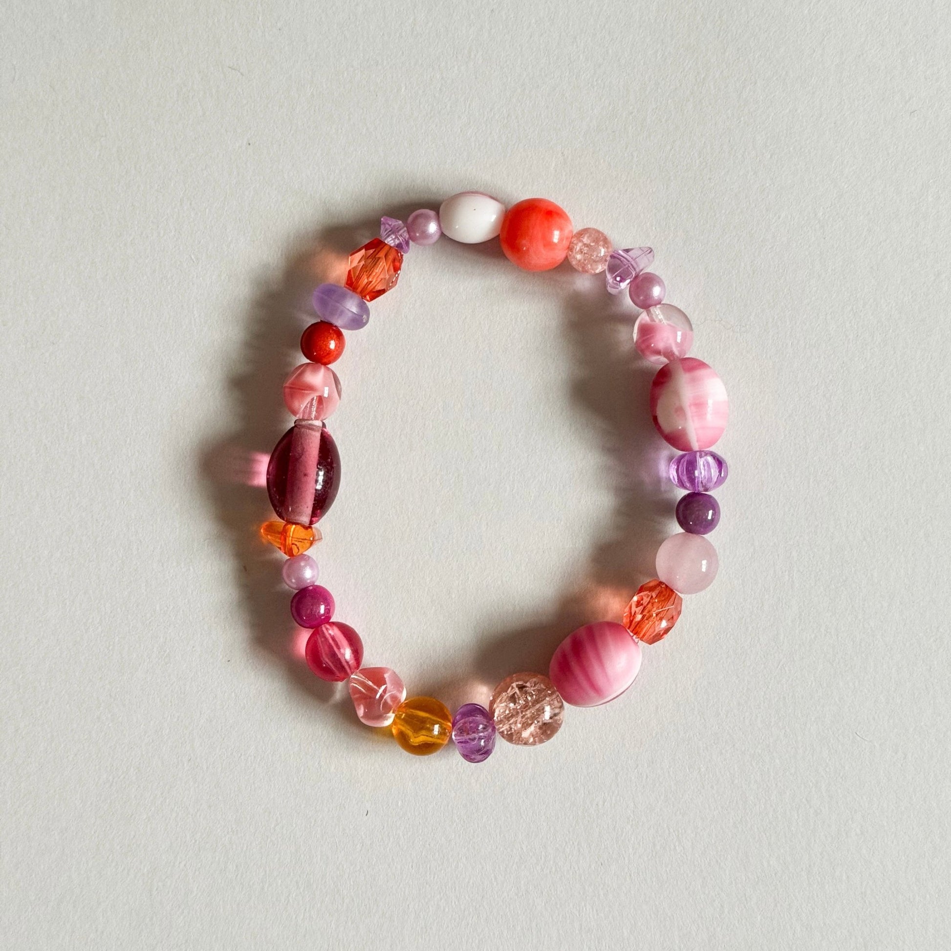 Pink and orange mix reclaimed beads beaded elastic bracelet - Bracelets - Made by Saskia