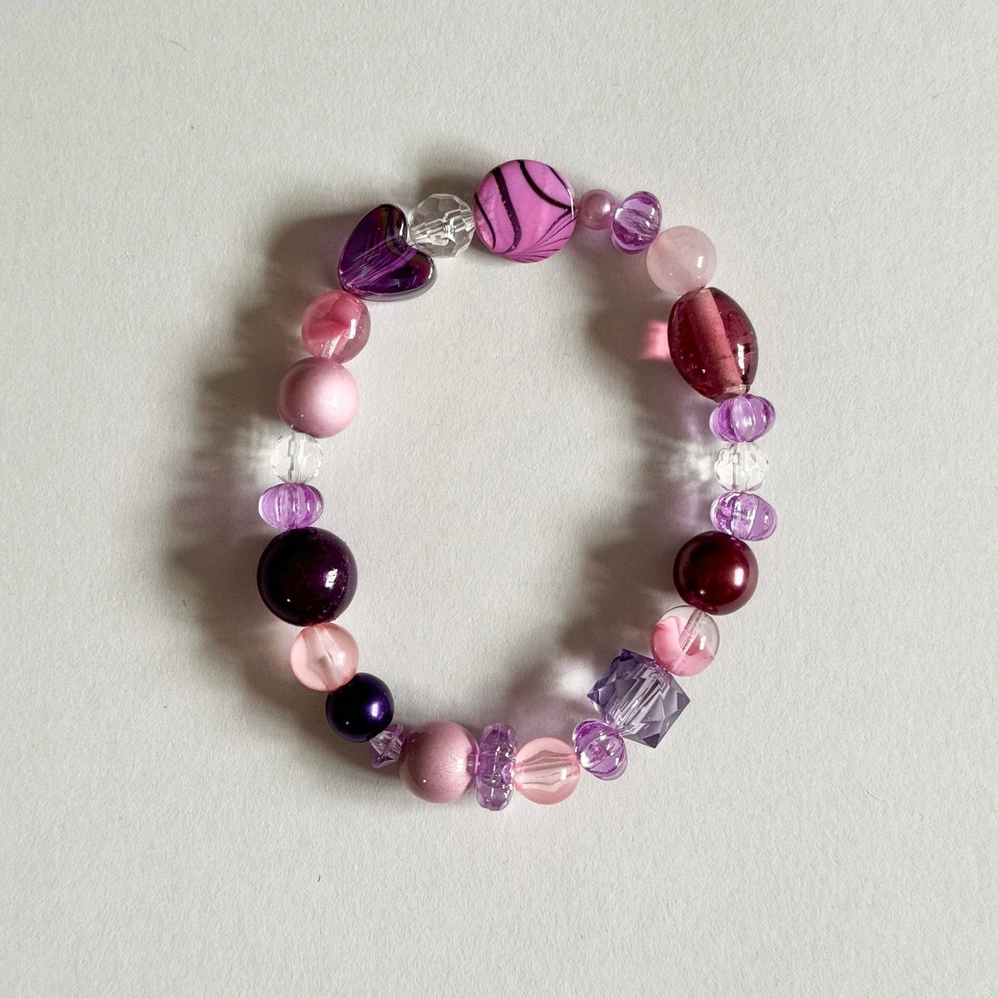 Purple mix reclaimed beads beaded elastic bracelet - Bracelets - Made by Saskia