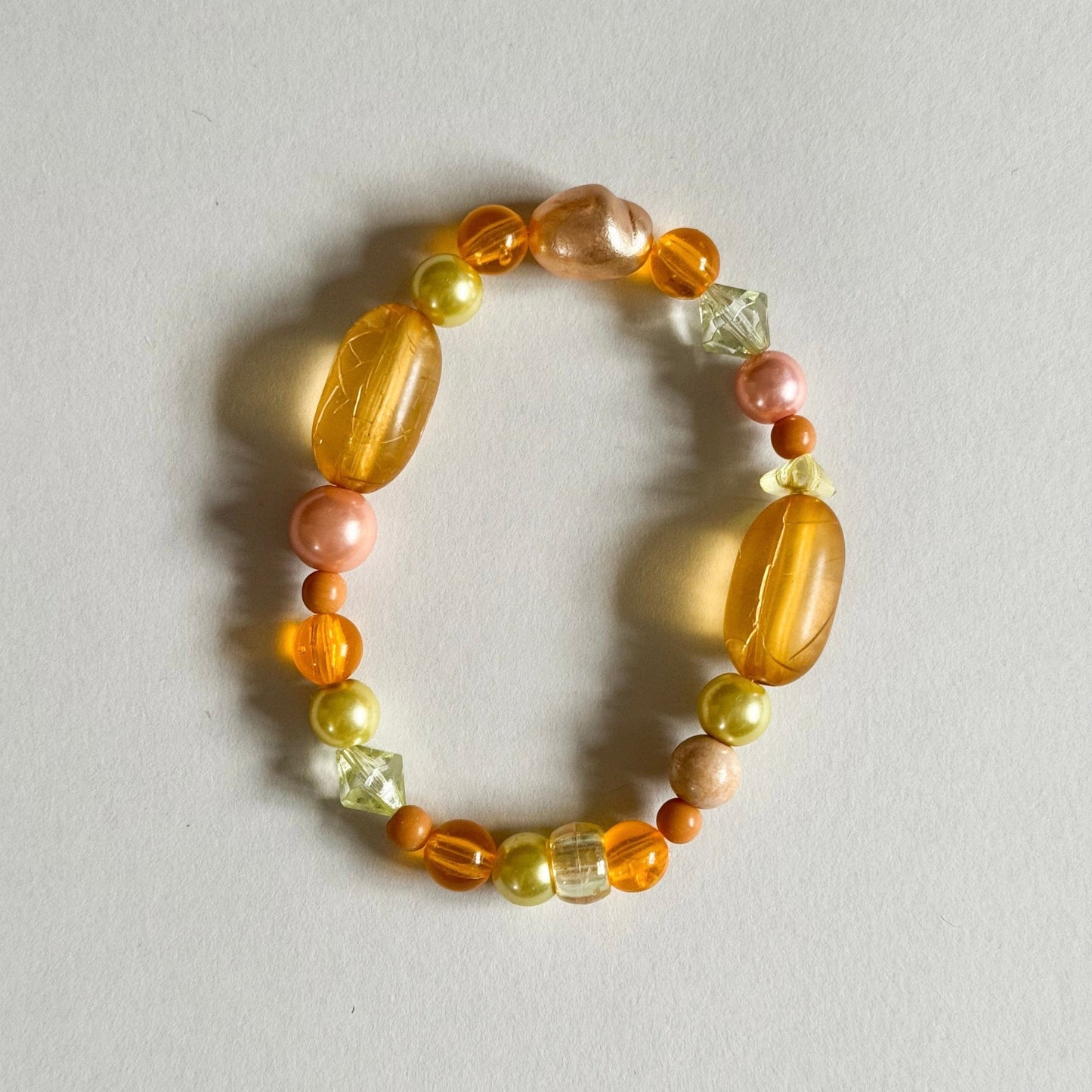 Yellow mix reclaimed beads beaded elastic bracelet - Bracelets - Made by Saskia