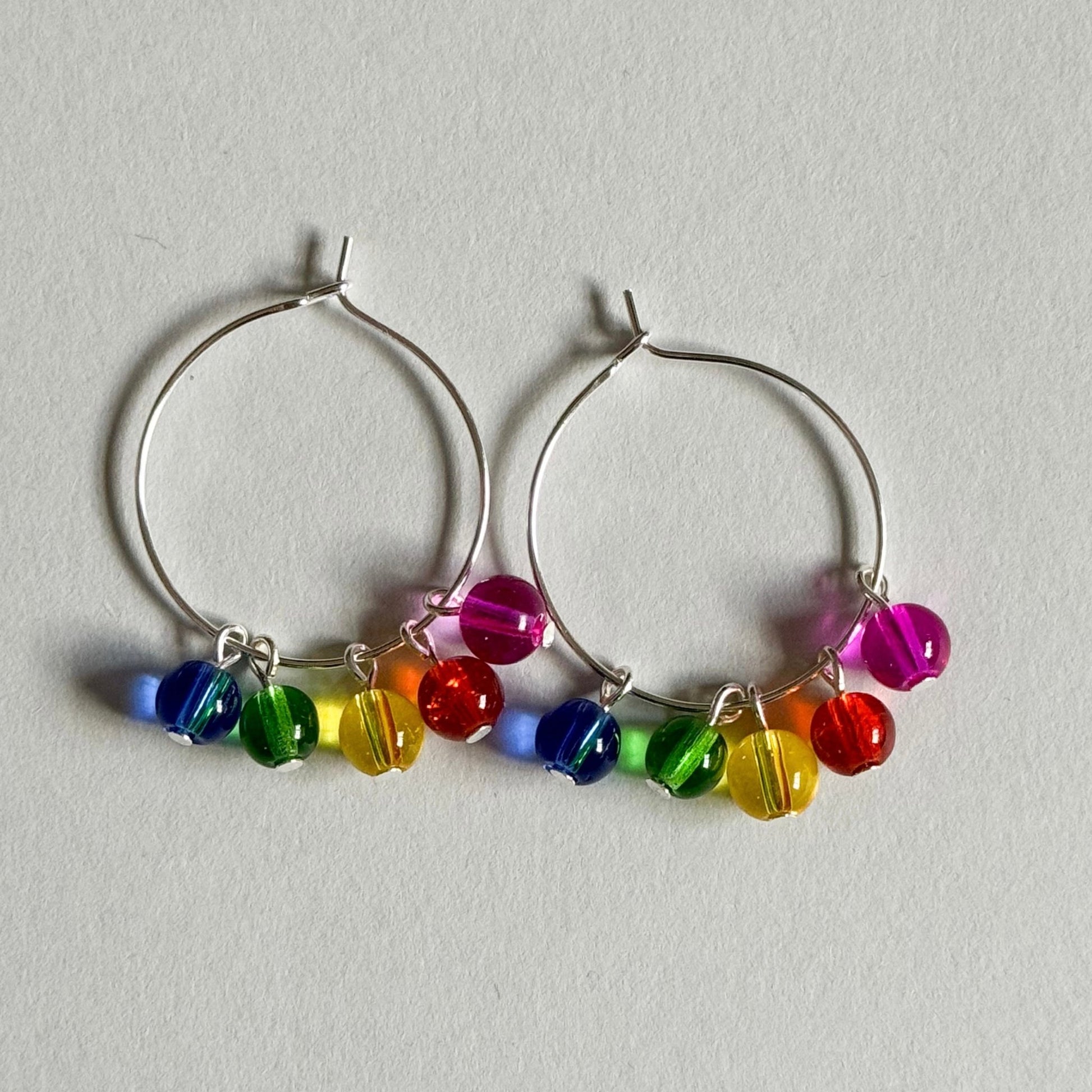 Rainbow beaded hoop earrings - Earrings - Made by Saskia