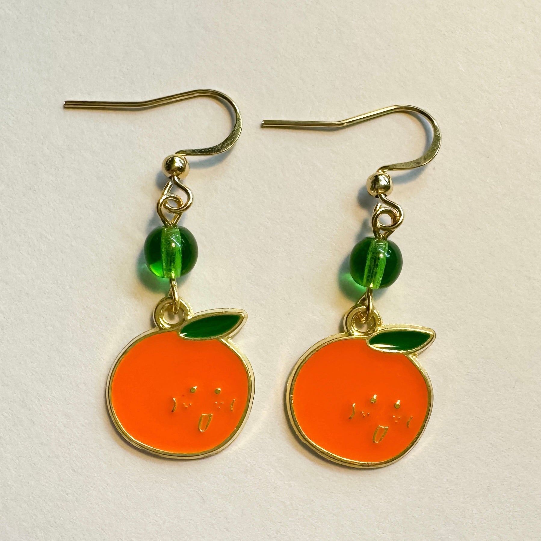 Smiley orange fruit dangle earrings - Earrings - Made by Saskia