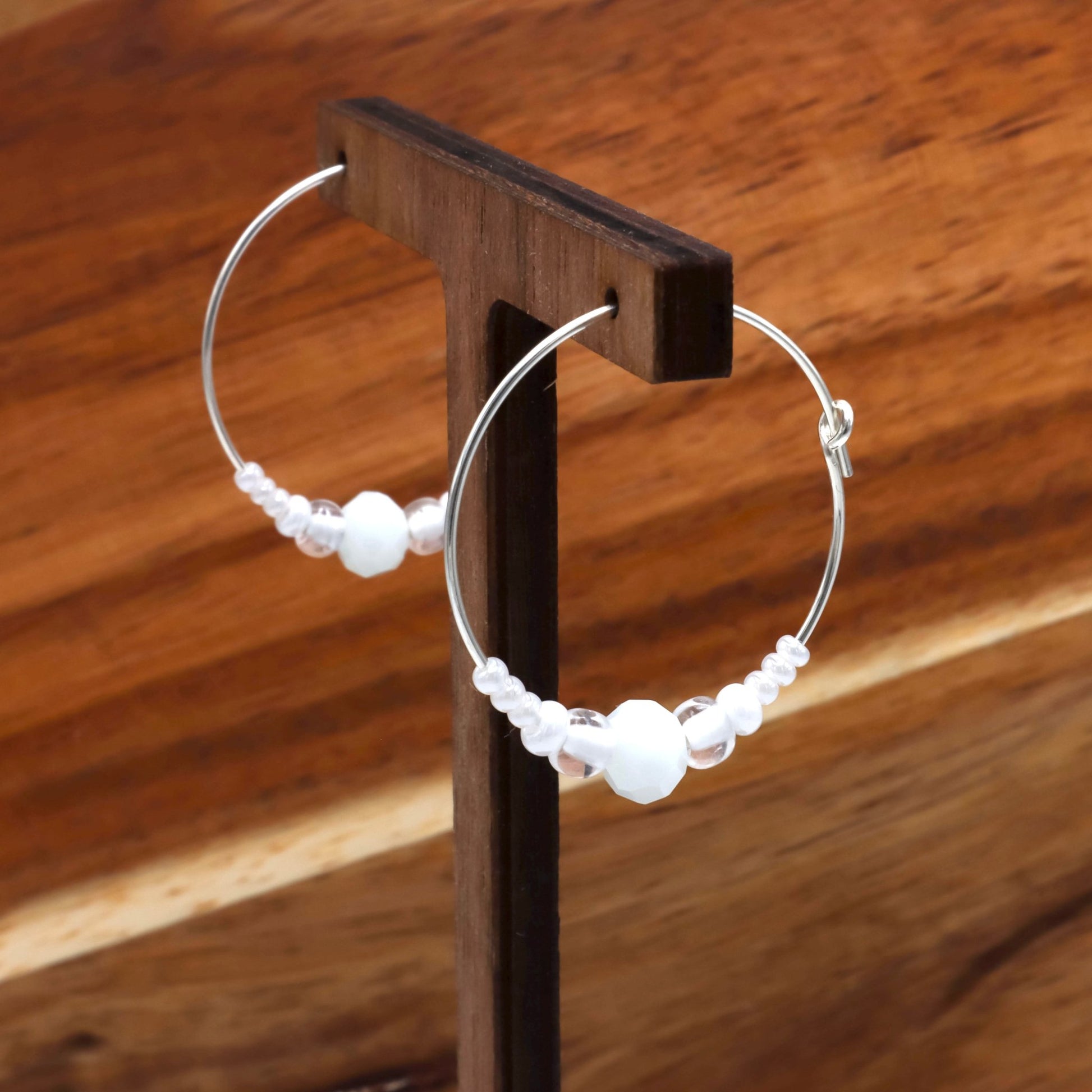 White glass beaded hoop earrings - Earrings - Made by Saskia